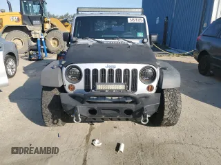2009 Jeep Wrangler X with VIN 1J4FA24119L729880, listed as a Copart auction lot 54576155 with 173,959 mi miles and Clean Title. Bid and sale history available at carsss.com. Image 5.