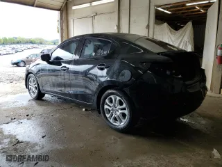 2018 Toyota Yaris iA with VIN 3MYDLBYV1JY323566, listed as a Copart auction lot 52021145 with 100,977 mi miles and Salvage Title. Bid and sale history available at carsss.com. Image 2.