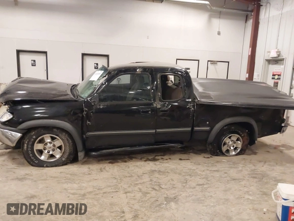 2001 Toyota Tundra SR5 with VIN 5TBRT34131S169696, listed as a IAAI auction lot 41481456 with 215,679 mi miles and . Bid and sale history available at DreamBid. Image 14.