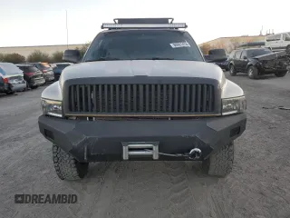 2000 Dodge Ram 2500 with VIN 1B7KF2369YJ144753, listed as a Copart auction lot 80801414 with 173,413 mi miles and Salvage Title. Bid and sale history available at carsss.com. Image 5.