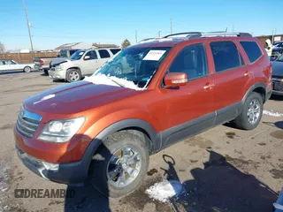 2009 Kia Borrego LX with VIN KNDJH741295034028, listed as a IAAI auction lot 41371961 with 99,785 mi miles. Bid and sale history available at carsss.com. Image 2.