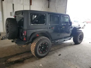 2012 Jeep Wrangler Unlimited Sahara with VIN 1C4BJWEG3CL195271, listed as a Copart auction lot 59947235 with 212,819 mi miles and Salvage title. Bid and sale history available at DreamBid. Image 3.