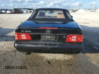 1999 Mercedes-Benz SL-Class with VIN WDBFA68F0XF186163, listed as a Copart auction lot 82669544 with 184,054 mi miles and Salvage Title. Bid and sale history available at carsss.com. Image 6.