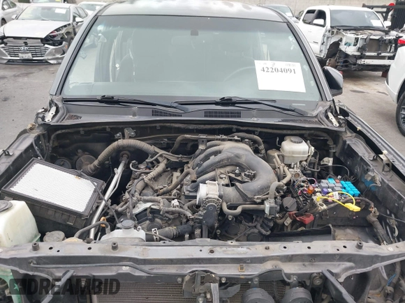2017 Toyota Tacoma SR5 with VIN 3TMDZ5BN1HM021526, listed as a IAAI auction lot 42204091 with 82,802 mi miles and . Bid and sale history available at DreamBid. Image 10.