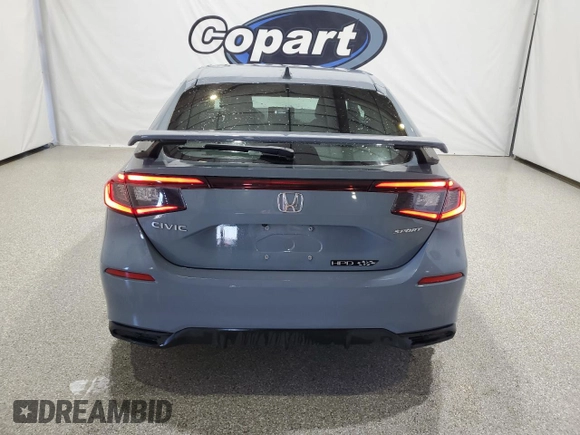 2023 Honda Civic Sport z VIN 19XFL2H89PE020319, wystawiony jako Copart lot #54294065 z przebiegiem 11 192 mil mil oraz Czysty tytuł • Clean title. Historia ofert i sprzedaży dostępna na DreamBid. Obrazek 6.
