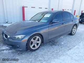 2013 BMW 3 Series 328i with VIN WBA3C1G59DNR48303, listed as a IAAI auction lot 41341686 with 84,303 mi miles. Bid and sale history available at carsss.com. Image 2.