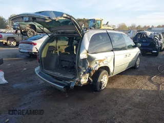 2003 Dodge Grand Caravan with VIN 2D4GP443X3R277421, listed as a IAAI auction lot 41035290 with 243,568 mi miles and . Bid and sale history available at DreamBid. Image 4.