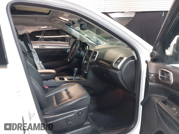 2013 Jeep Grand Cherokee Laredo with VIN 1C4RJFAG9DC532919, listed as a IAAI auction lot 40918828 with 140,093 mi miles. Bid and sale history available at carsss.com. Image 5.
