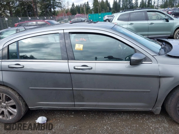 2011 Chrysler 200 Touring with VIN 1C3BC1FG2BN603732, listed as a IAAI auction lot 41938310 with 131,361 mi miles. Bid and sale history available at carsss.com. Image 13.