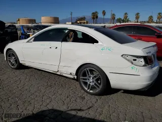 2015 Mercedes-Benz E-Class E 400 with VIN WDDKJ6FB0FF294447, listed as a Copart auction lot 84929364 with 96,689 mi miles and Salvage Title. Bid and sale history available at carsss.com. Image 2.