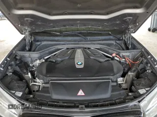 2014 BMW X5 xDrive50i z VIN 5UXKR6C58E0C03414, wystawiony jako Copart lot #47437935 z przebiegiem 126 402 mil mil oraz Szkoda całkowita • Salvage title. Historia ofert i sprzedaży dostępna na DreamBid. Obrazek 11.