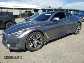 2018 Infiniti Q60 Luxe with VIN JN1EV7EL2JM390826, listed as a Copart auction lot 52806915 with 99,400 mi miles and Salvage title. Bid and sale history available at DreamBid. Image 1.