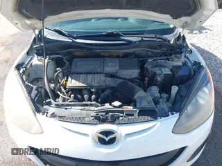 2014 Mazda 2 Sport with VIN JM1DE1KY0E0175562, listed as a IAAI auction lot 42023803 with 247,411 mi miles and . Bid and sale history available at carsss.com. Image 10.