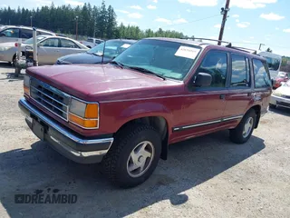 1992 Ford Explorer Eddie Bauer with VIN 1FMDU34X9NUD68865, listed as a IAAI auction lot 42634529 with 33,505 mi miles and . Bid and sale history available at DreamBid. Image 2.