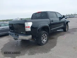 2011 Toyota Tundra 4WD Truck with VIN 5TFDW5F10BX166901, listed as a IAAI auction lot 41876554 with 207,187 mi miles. Bid and sale history available at carsss.com. Image 4.