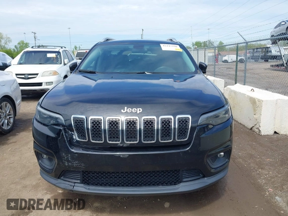 2019 Jeep Cherokee Latitude Plus with VIN 1C4PJMLB5KD489488, listed as a IAAI auction lot 42147598 with 33,002 mi miles and . Bid and sale history available at carsss.com. Image 13.
