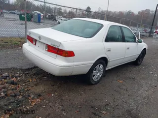 2000 Toyota Camry CE with VIN 4T1BG22K2YU976361, listed as a IAAI auction lot 38059387 with 153,541 mi miles. Bid and sale history available at carsss.com. Image 4.