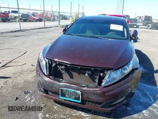 2013 Kia Optima LX z VIN 5XXGM4A7XDG241462, wystawiony jako IAAI lot #41774969 z przebiegiem 151 819 mil mil oraz . Historia ofert i sprzedaży dostępna na DreamBid. Obrazek 6.