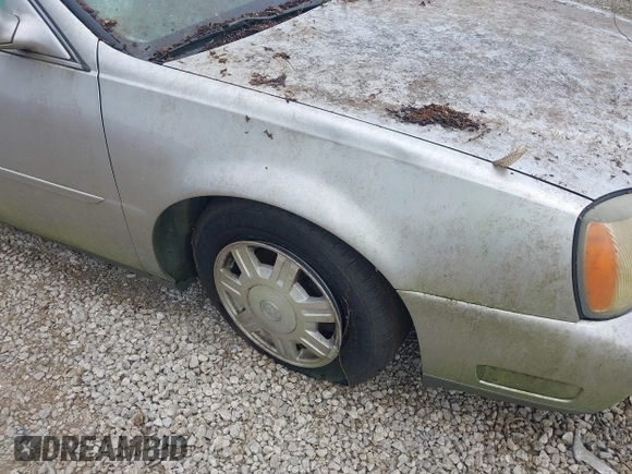 2005 Cadillac DeVille z VIN 1G6KD54Y25U147188, wystawiony jako IAAI lot #42421182 z przebiegiem Nie podano mil oraz . Historia ofert i sprzedaży dostępna na DreamBid. Obrazek 6.