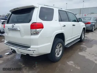 2011 Toyota 4Runner SR5 with VIN JTEZU5JR7B5014100, listed as a IAAI auction lot 41769637 with 215,474 mi miles. Bid and sale history available at carsss.com. Image 4.