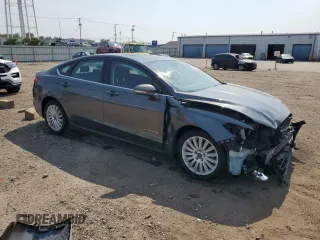 2015 Ford Fusion SE Hybrid with VIN 3FA6P0LU2FR171982, listed as a Copart auction lot 60216585 with 113,750 mi miles and Salvage title. Bid and sale history available at DreamBid. Image 4.