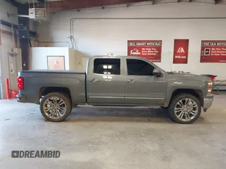 2015 Chevrolet Silverado 1500 LTZ with VIN 3GCUKSEC1FG473825, listed as a IAAI auction lot 41710553 with 212,959 mi miles and . Bid and sale history available at DreamBid. Image 14.