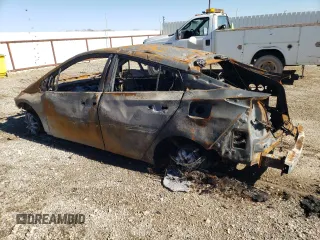 2021 Toyota Prius LE with VIN JTDKAMFP3M3173159, listed as a Copart auction lot 86616494 with Not provided miles and Salvage title. Bid and sale history available at DreamBid. Image 2.