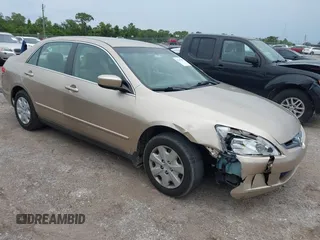 2004 Honda Accord LX with VIN 1HGCM56374A153377, listed as a IAAI auction lot 42399599 with 188,895 mi miles and . Bid and sale history available at DreamBid. Image 1.