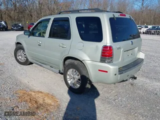 2006 Mercury Mariner Luxury with VIN 4M2CU56156DJ05613, listed as a IAAI auction lot 41305481 with 164,896 mi miles. Bid and sale history available at carsss.com. Image 3.