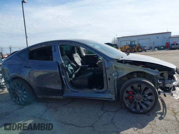 2023 Tesla Model Y Performance with VIN 7SAYGDEF7PF590750, listed as a IAAI auction lot 41694002 with Not Provided miles and . Bid and sale history available at DreamBid. Image 13.