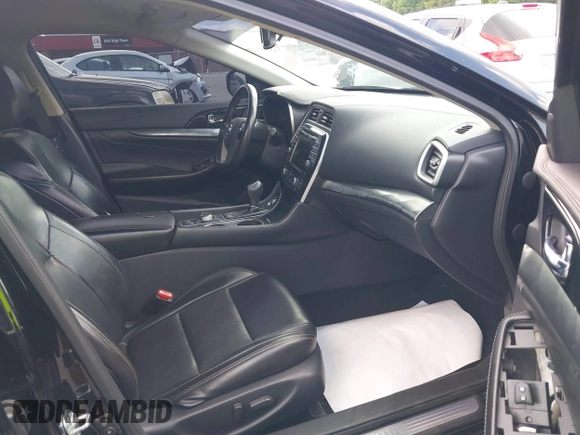 2020 Nissan Maxima SV with VIN 1N4AA6CV5LC364726, listed as a IAAI auction lot 42747680 with 151,806 mi miles and . Bid and sale history available at DreamBid. Image 5.