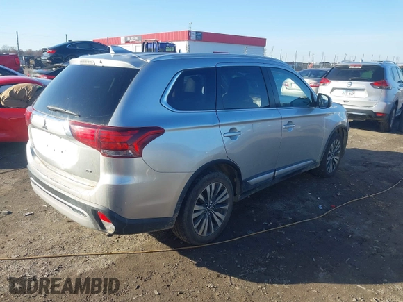 2020 Mitsubishi Outlander ES with VIN JA4AZ3A32LZ018238, listed as a IAAI auction lot 41129342 with 142,946 mi miles and . Bid and sale history available at DreamBid. Image 4.