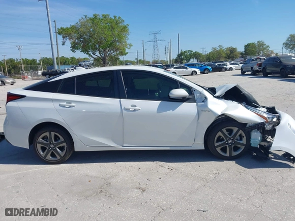 2022 Toyota Prius L Eco with VIN JTDKAMFU1N3177444, listed as a IAAI auction lot 41812402 with 44,666 mi miles. Bid and sale history available at carsss.com. Image 13.