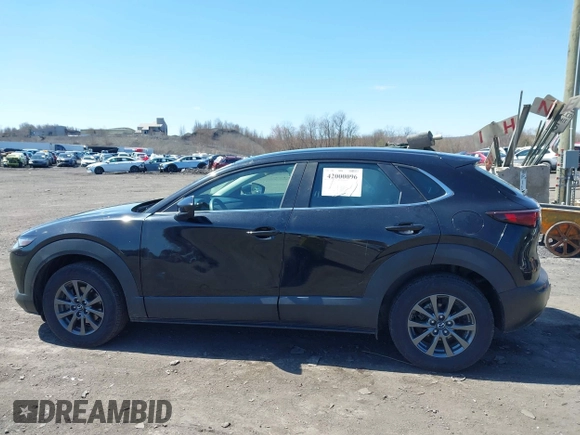 2021 Mazda CX-30 S with VIN 3MVDMBAL3MM214735, listed as a IAAI auction lot 42000096 with 46,794 mi miles and . Bid and sale history available at DreamBid. Image 14.