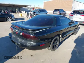 2002 Pontiac Firebird with VIN 2G2FS22K022109417, listed as a IAAI auction lot 41199057 with 124,463 mi miles. Bid and sale history available at carsss.com. Image 4.