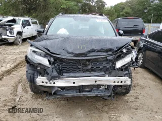 2019 Honda Passport Touring z VIN 5FNYF7H96KB000201, wystawiony jako Copart lot #73759134 z przebiegiem Nie podano mil oraz Szkoda całkowita • Salvage title. Historia ofert i sprzedaży dostępna na DreamBid. Obrazek 5.