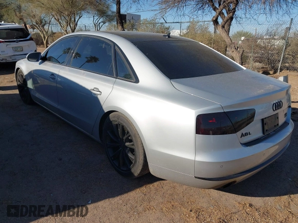 2011 Audi A8 z VIN WAURVAFD4BN020585, wystawiony jako IAAI lot #41841459 z przebiegiem 110 536 mil mil oraz . Historia ofert i sprzedaży dostępna na DreamBid. Obrazek 3.