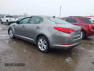 2013 Kia Optima EX z VIN 5XXGN4A72DG166687, wystawiony jako IAAI lot #41967631 z przebiegiem 202 712 mil mil oraz . Historia ofert i sprzedaży dostępna na DreamBid. Obrazek 3.