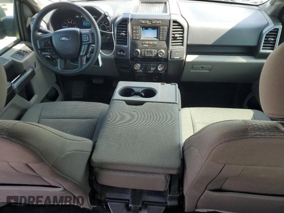 2018 Ford F-150 XL with VIN 1FTEW1CP4JKE20952, listed as a Copart auction lot 62561945 with 179,097 mi miles and Salvage title. Bid and sale history available at DreamBid. Image 8.