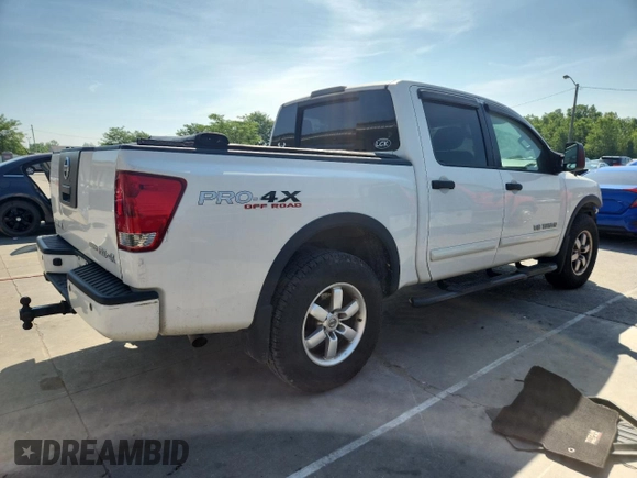 2012 Nissan Titan SL with VIN 1N6BA0EC9CN324495, listed as a Copart auction lot 60982445 with 142,430 mi miles and Salvage title. Bid and sale history available at DreamBid. Image 3.