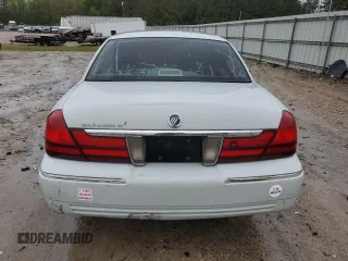 2003 Mercury Grand Marquis GS Convenience z VIN 2MEFM74W53X702387, wystawiony jako Copart lot #52852475 z przebiegiem 246 543 mil mil oraz Szkoda całkowita • Salvage title. Historia ofert i sprzedaży dostępna na DreamBid. Obrazek 6.