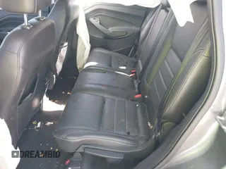 2014 Ford Escape Titanium with VIN 1FMCU9J93EUC72752, listed as a IAAI auction lot 41827668 with 91,194 mi miles and . Bid and sale history available at DreamBid. Image 8.