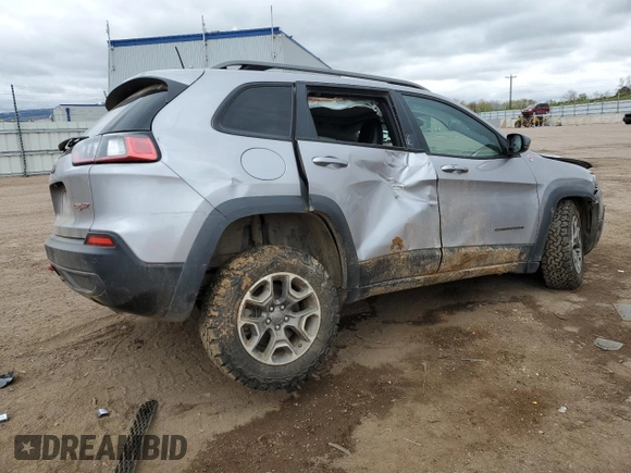 2021 Jeep Cherokee Trailhawk with VIN 1C4PJMBX2MD143446, listed as a Copart auction lot 55166945 with 83,841 mi miles and Salvage title. Bid and sale history available at DreamBid. Image 3.