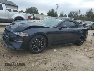 2021 Ford Mustang EcoBoost with VIN 1FATP8UH1M5115602, listed as a Copart auction lot 82803474 with 83,744 mi miles and Salvage Title. Bid and sale history available at carsss.com. Image 1.