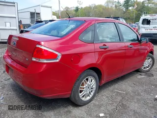 2009 Ford Focus SE with VIN 1FAHP35N89W243205, listed as a IAAI auction lot 42149989 with 148,058 mi miles. Bid and sale history available at carsss.com. Image 4.