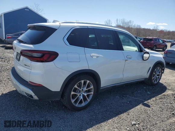 2021 BMW X5 xDrive45e with VIN 5UXTA6C02M9F03198, listed as a Copart auction lot 51805015 with 42,350 mi miles and Salvage Title. Bid and sale history available at DreamBid. Image 3.