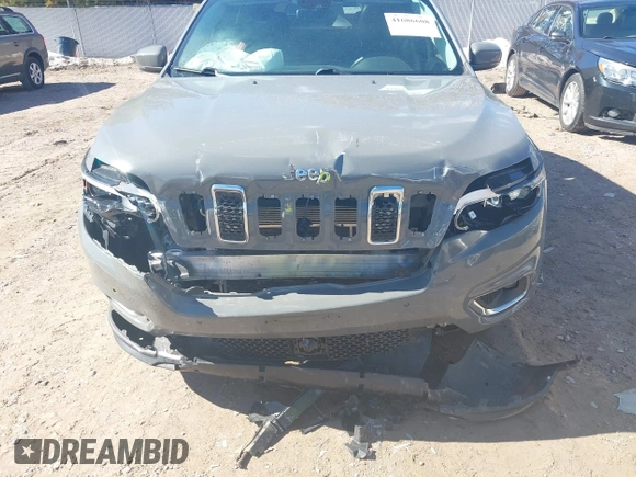 2021 Jeep Cherokee Limited with VIN 1C4PJMDX5MD119364, listed as a IAAI auction lot 41686608 with 92,732 mi miles and . Bid and sale history available at DreamBid. Image 6.