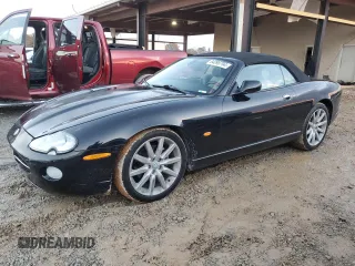 2005 Jaguar XK with VIN SAJDA42C252A42182, listed as a Copart auction lot 84096794 with 146,461 mi miles and Salvage Title. Bid and sale history available at carsss.com. Image 1.