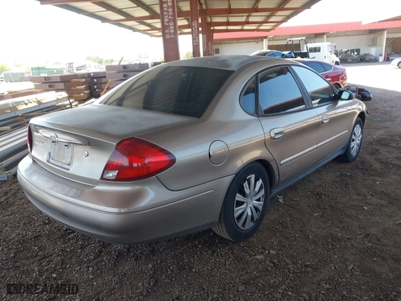 2002 Ford Taurus LX with VIN 1FAFP52U72G284116, listed as a IAAI auction lot 42004075 with 86,544 mi miles. Bid and sale history available at carsss.com. Image 4.