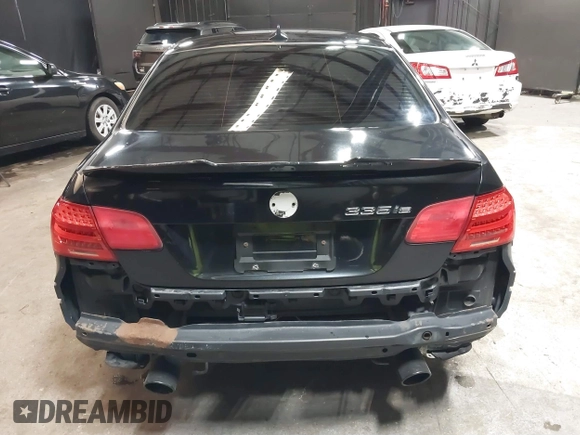 2011 BMW 3 Series 335is with VIN WBAKG1C51BE618450, listed as a IAAI auction lot 41555179 with 100,942 mi miles and . Bid and sale history available at carsss.com. Image 16.